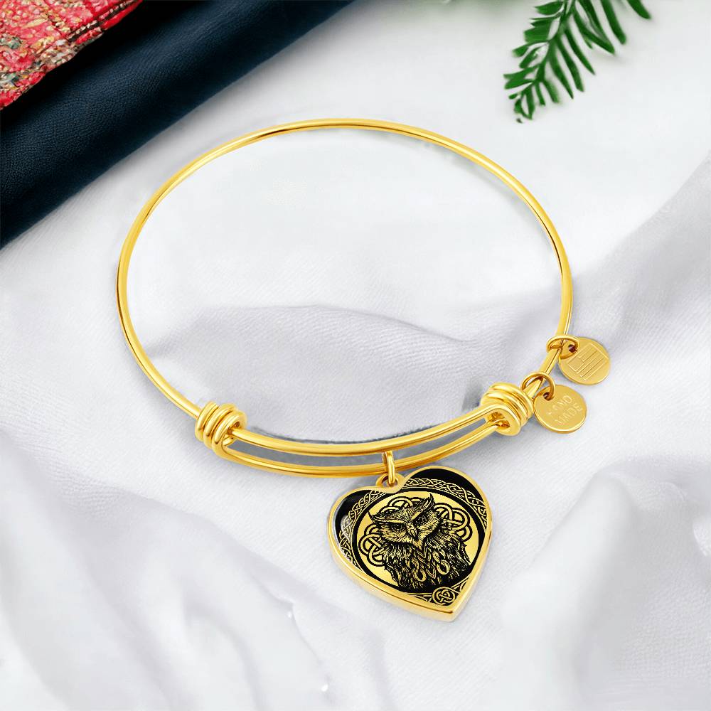 an elegant gold pendant Celtic Owl Bracelet. Colors are gold and black. This jewelry offers personalization with an engraving option for a name.