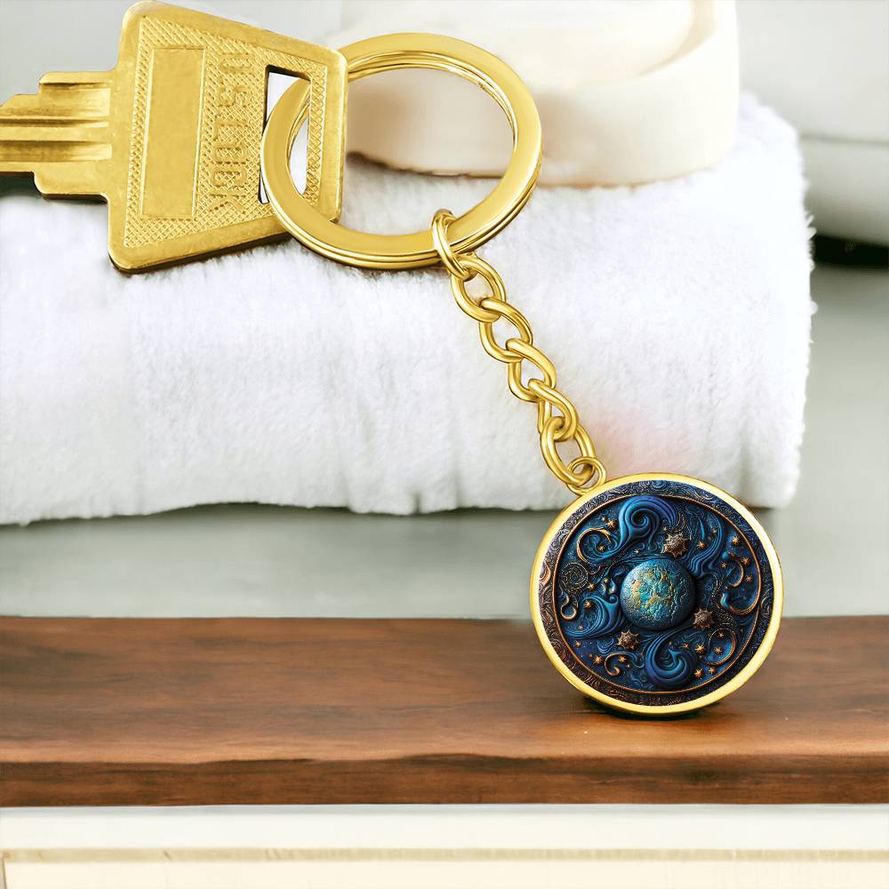 Elegant gold Wizard Spell Celestial Pendant Personalized Keychain, set against a space blue and gold backdrop. This jewelry offers personalization with an engraving option for a name.