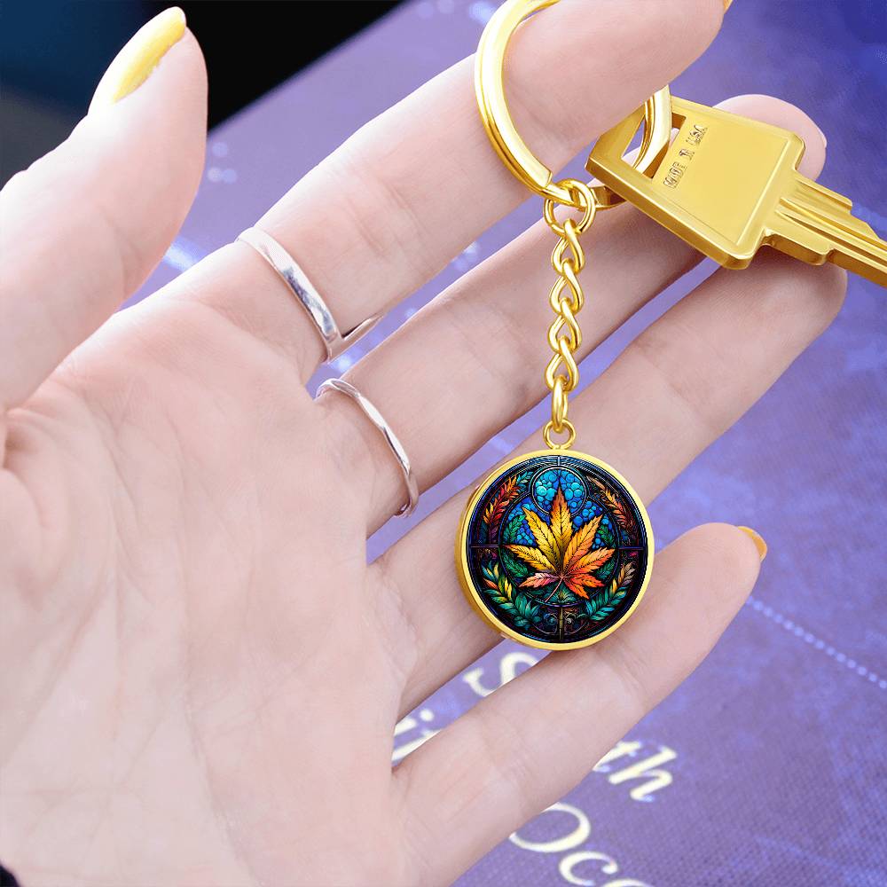 Gold Marijuana Keychain in a woman's hand