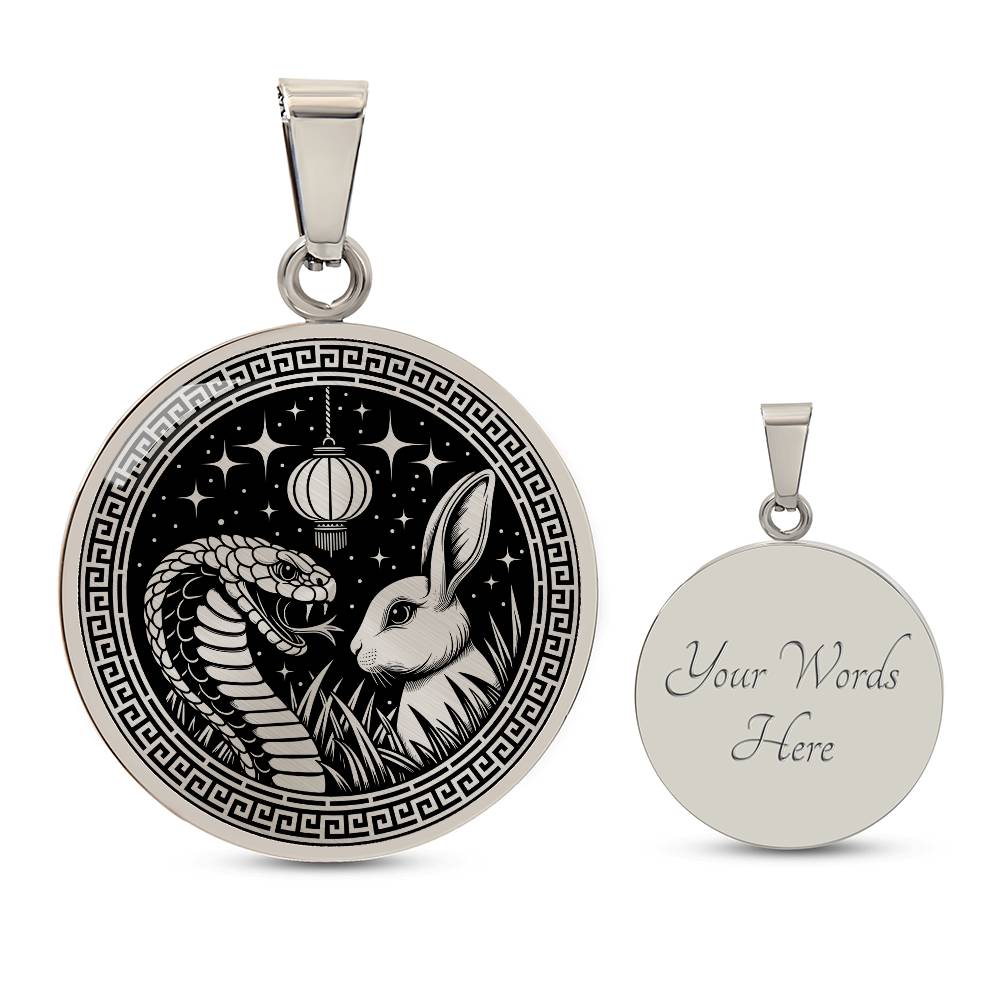 An Elegant silver pendant featuring a Year of the Rabbit and Year of The Snake Necklace in silver and black. This jewelry offers personalization with an engraving option for a name.