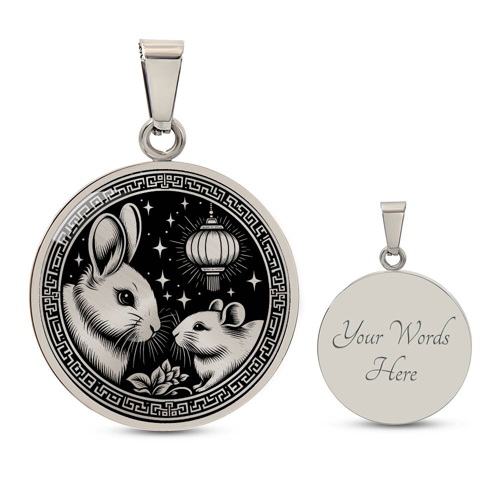 An Elegant silver pendant featuring a Year of the Rat and Year of The Rabbit Necklace in silver and black. This jewelry offers personalization with an engraving option for a name.