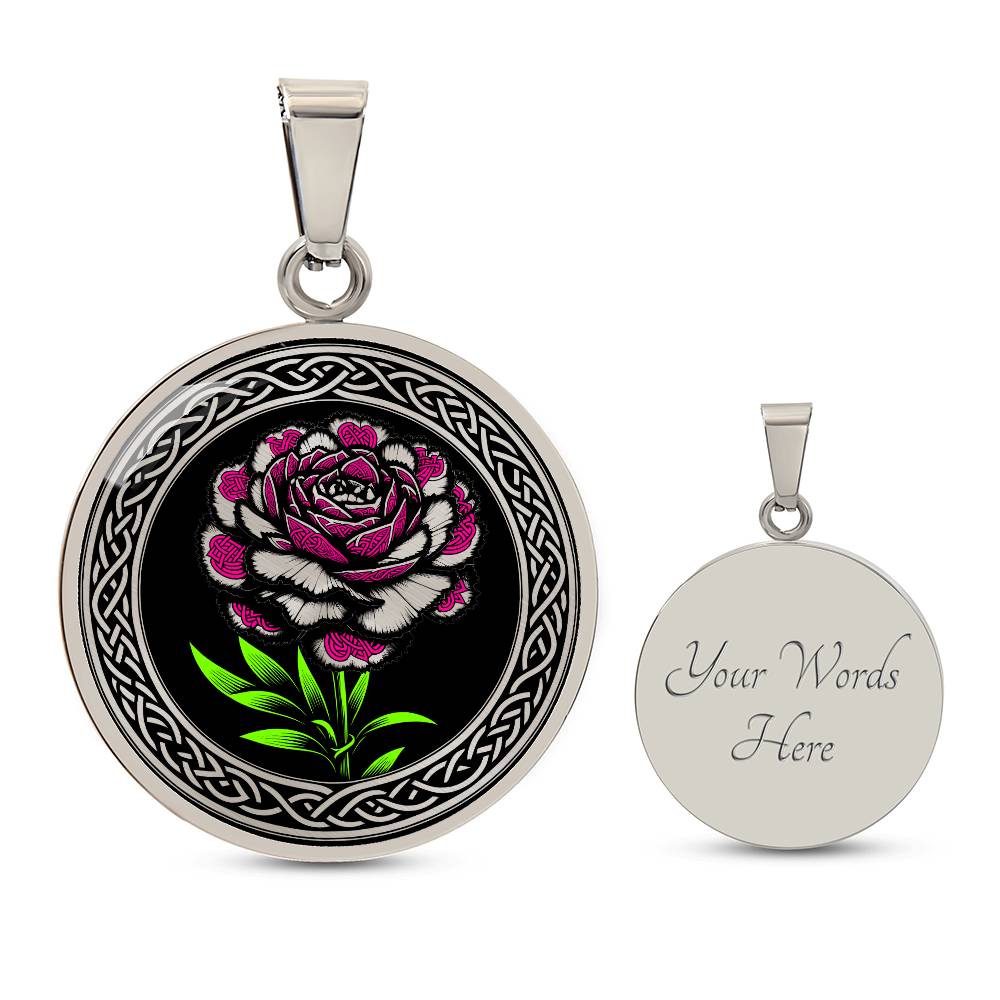 an Elegant January silver pendant Celtic Carnation Birth Flower necklace featuring a vivid pink, green and silver flower, set against a black backdrop. This jewelry offers personalization with an engraving option for a name.