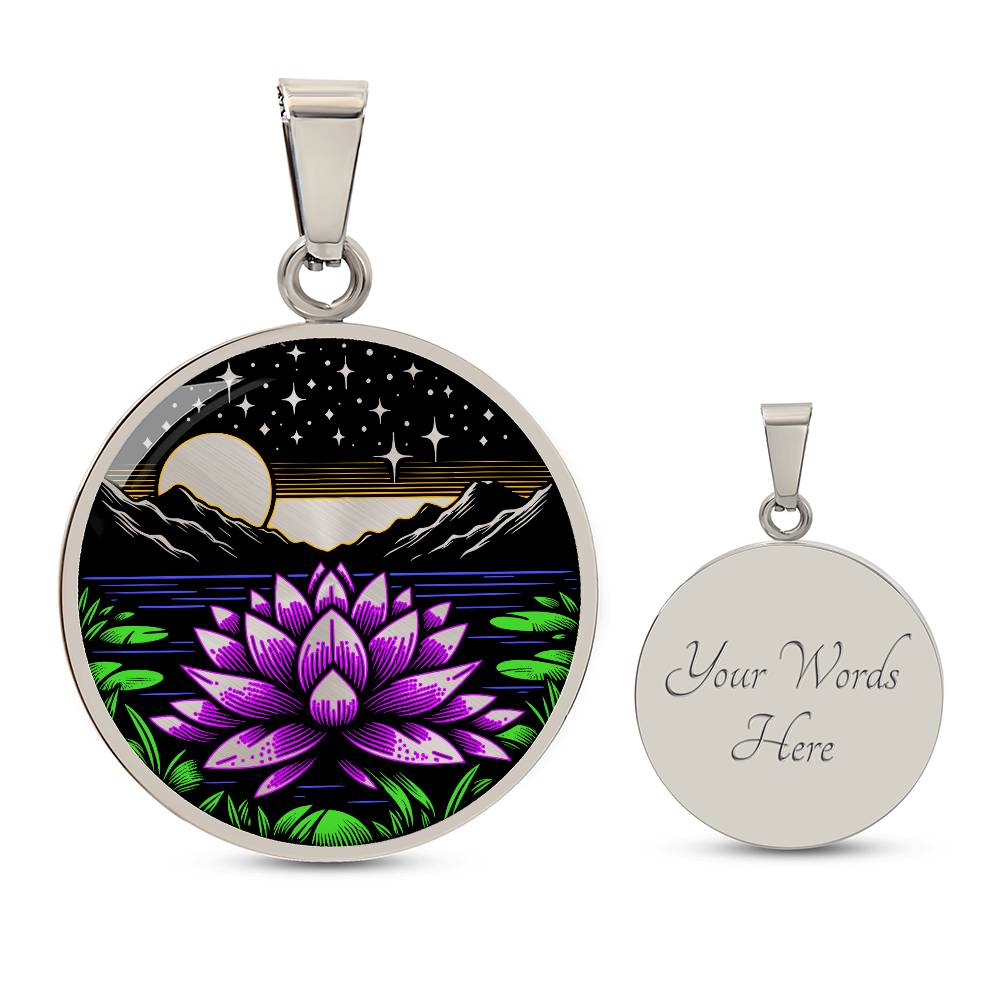 An Elegant silver pendant Water Lily Necklace featuring Mountains, Stars, Yellow outline Sun, Green grass Lily Pads, Blue Water, Pink lily, black and silver Background. This jewelry offers personalization with an engraving option for a name.