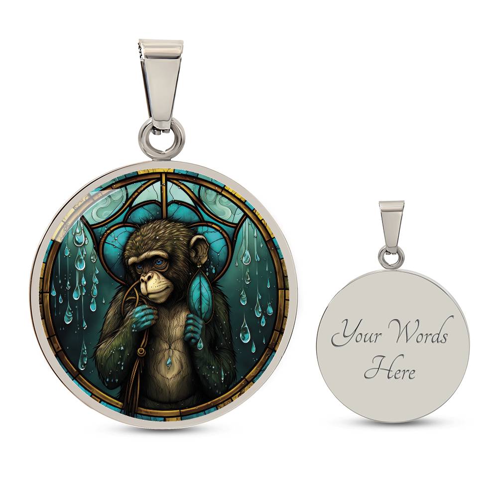 An elegant silver pendant Chinese Zodiac Monkey Necklace. The colors are yellow, blue, teal, brown and green. This jewelry offers personalization with an engraving option for a name.