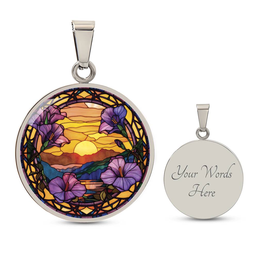 an elegant silver pendant Morning Glory Necklace. The colors are purple flowers, blue/green/purple hills, Brown mountains, Yellow sun and sky. This jewelry offers personalization with an engraving option for a name.