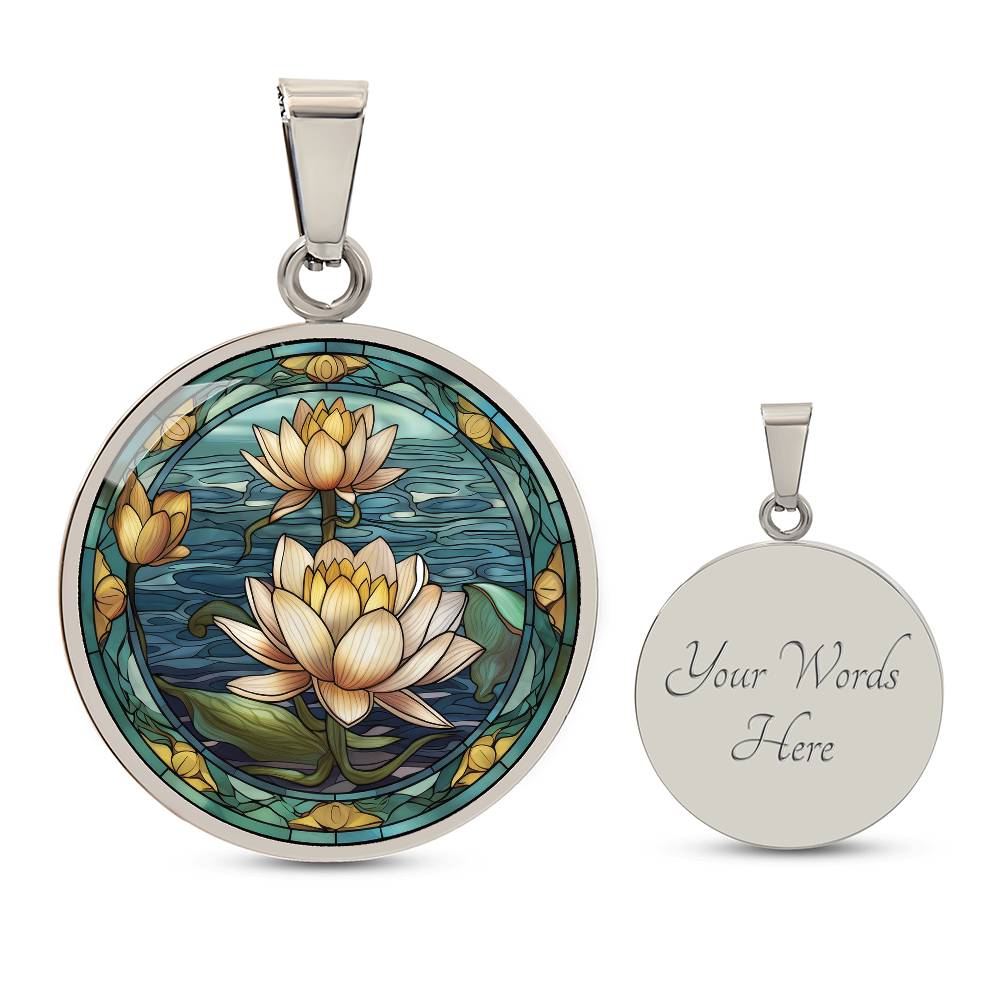 an elegant silver pendant Water Lily Necklace. The colors are Green Leaves, Blue Water and Tan Flowers. This jewelry offers personalization with an engraving option for a name.