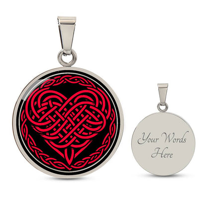 Elegant silver pendant featuring a vivid red Heart Celtic Necklace set against a Black & silver backdrop. This jewelry offers personalization with an engraving option for a name.