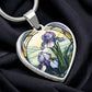 Silver Heart Pendant Purple Iris flower necklace, With green grass, a Yellow sunset and Green mountains. This necklace offers personalization option for a name.