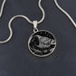 An elegant silver pendant Crow Necklace. The colors are gold and black. This jewelry offers personalization with an engraving option for a name.
