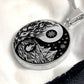 Elegant silver pendant featuring a vivid Silver Fire, Water, snowflakes and Icebergs. set against a Black backdrop. This jewelry offers personalization with an engraving option for a name.