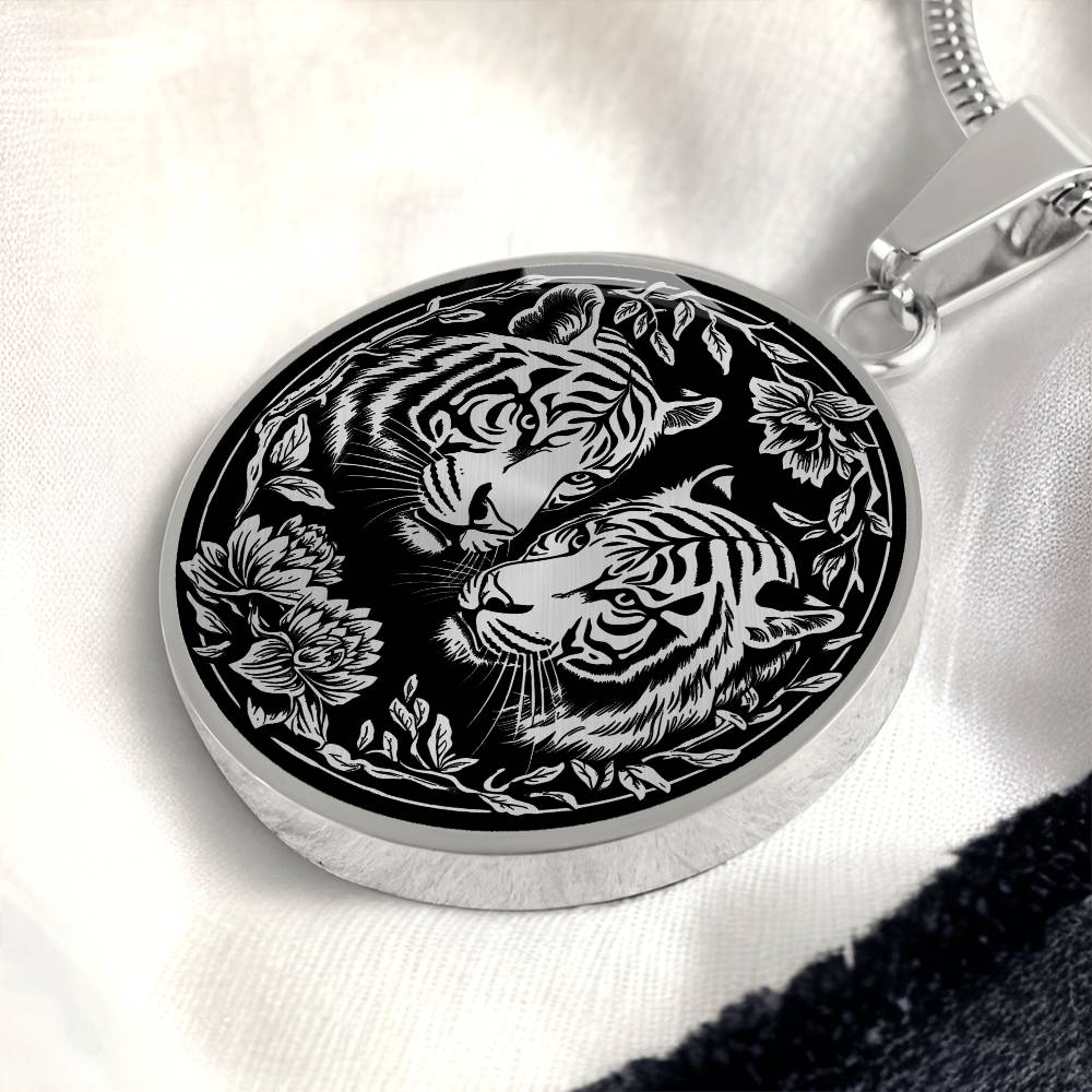 An elegant silver pendant Year of the Tiger Necklace. The colors are silver and black. This jewelry offers personalization with an engraving option for a name.