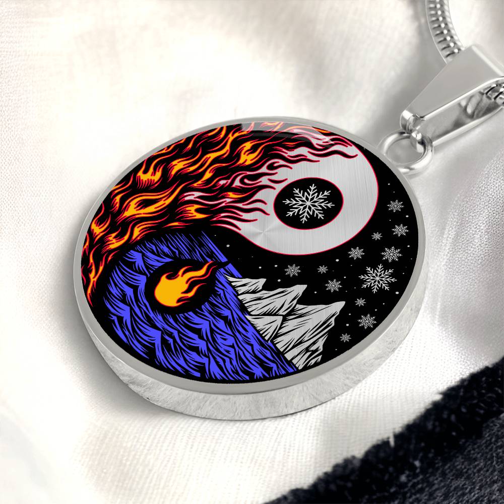 Elegant silver pendant featuring a vivid Red/Orange Fire, Blue Water, Silver snow flakes and Silver Icebergs. set against a silver & Black backdrop. This jewelry offers personalization with an engraving option for a name.