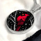 An Elegant silver pendant featuring a vivid Red Northern Cardinal Necklace with Stars and a tree Branch all in a silver and black backdrop. This jewelry offers personalization with an engraving option for a name.