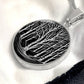 Elegant silver pendant featuring a vivid silver Birch Tree Necklace, set against a Black backdrop. This jewelry offers personalization with an engraving option for a name.