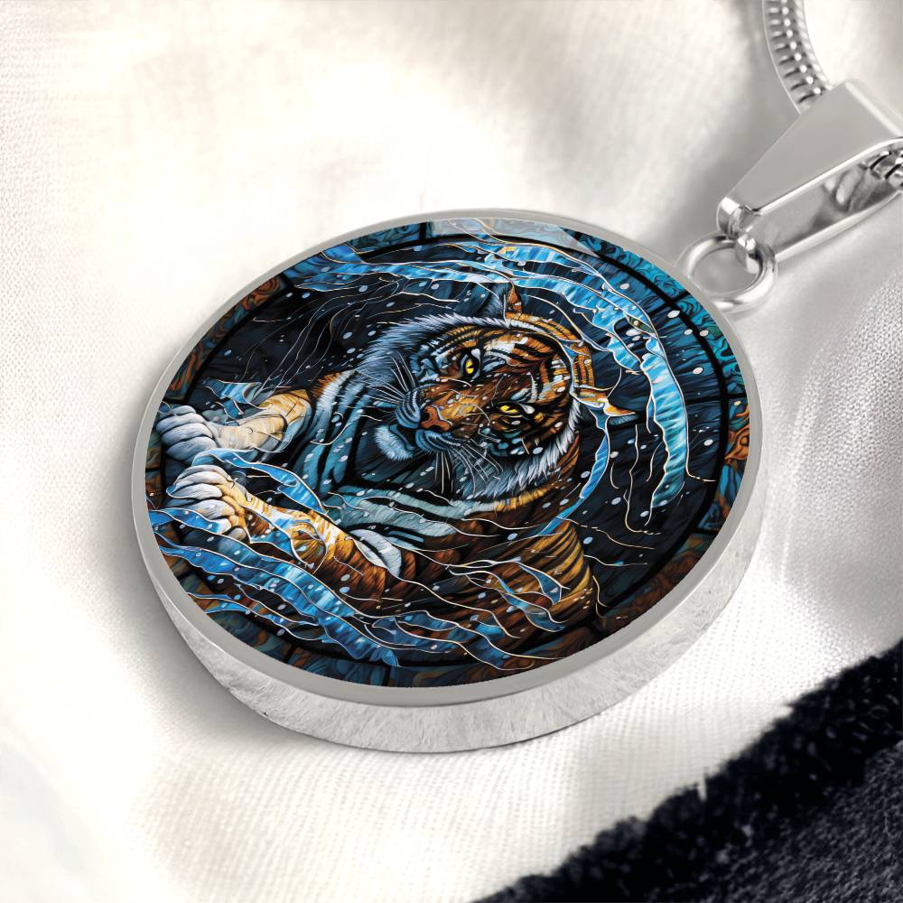 An elegant silver pendant Chinese Zodiac Tiger Necklace. The colors are blue, black, orange, white and yellow. This jewelry offers personalization with an engraving option for a name.