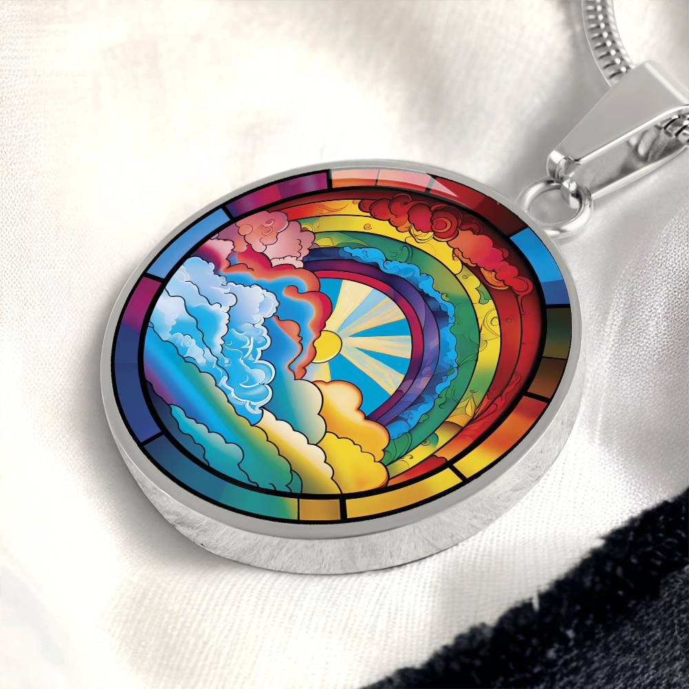 an elegant silver pendant Lucky Rainbow Necklace. The colors are all the colors of the rainbow. This jewelry offers personalization with an engraving option for a name.