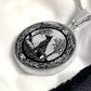 An Elegant silver pendant Celtic Wolf necklace With a silver and Black background. This jewelry offers personalization with an engraving option for a name.