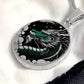 an Elegant silver pendant Chinese Dragon necklace featuring a vivid Jade dragon with stars and clouds set against a black backdrop. This jewelry offers personalization with an engraving option for a name.
