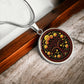 an elegant silver pendant Marigold Celtic Tree of Life Necklace. The Colors are yellow, green, brown and black. This jewelry offers personalization with an engraving option for a name.