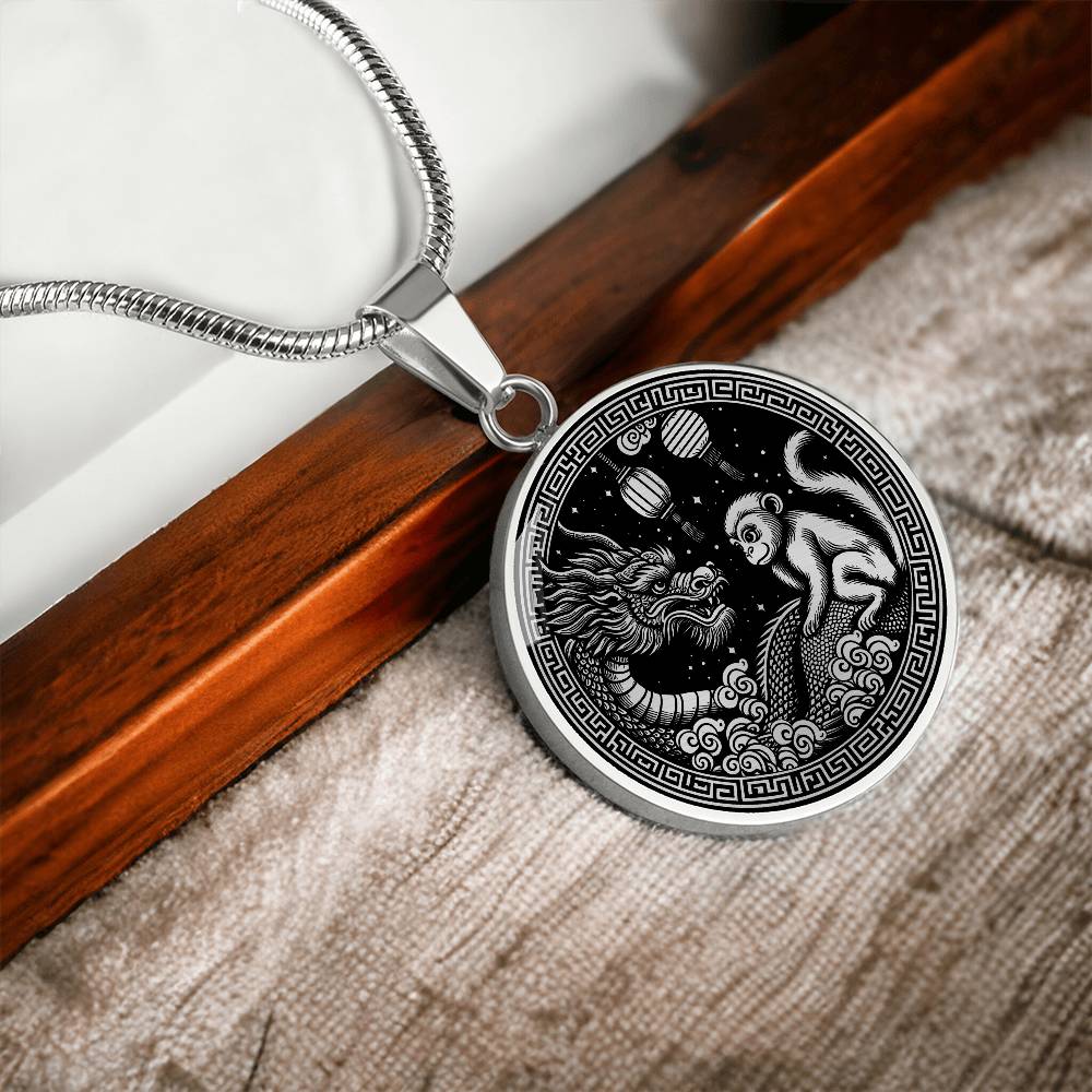 An Elegant silver pendant featuring a Year of the Monkey and Year of The Dragon Necklace in silver and black. This jewelry offers personalization with an engraving option for a name.