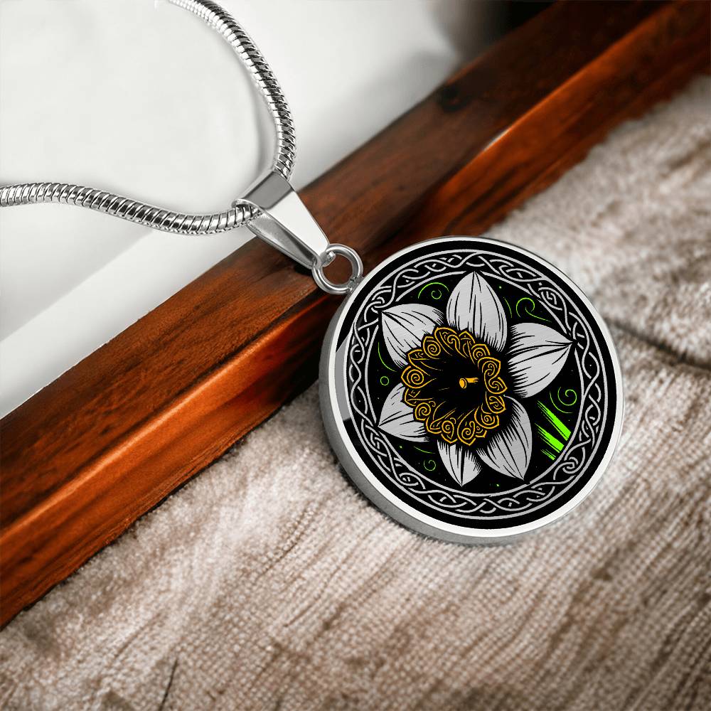 Elegant silver pendant featuring a vivid Yellow Daffodil Birth Flower Necklace, March birth month flower, set against a Green & Black backdrop with a Celtic border. Personalization with an engraving option for a name.