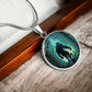 an Elegant silver pendant Bigfoot Necklace. Colors are Green, Brown, Black, Blue and White. This jewelry offers personalization with an engraving option for a name.