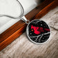 An Elegant silver pendant featuring a vivid Red Northern Cardinal Necklace with Stars and a tree Branch all in a silver and black backdrop. This jewelry offers personalization with an engraving option for a name.