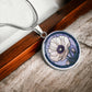 an Elegant silver pendant Anemone Necklace. The Colors are Purple Gray, Dark Green. This jewelry offers personalization with an engraving option for a name.