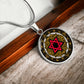 An Elegant silver pendant featuring a Vintage Design with a vivid Red Star of David Necklace, set against a gold, silver and black backdrop. This jewelry offers personalization with an engraving option for a name.