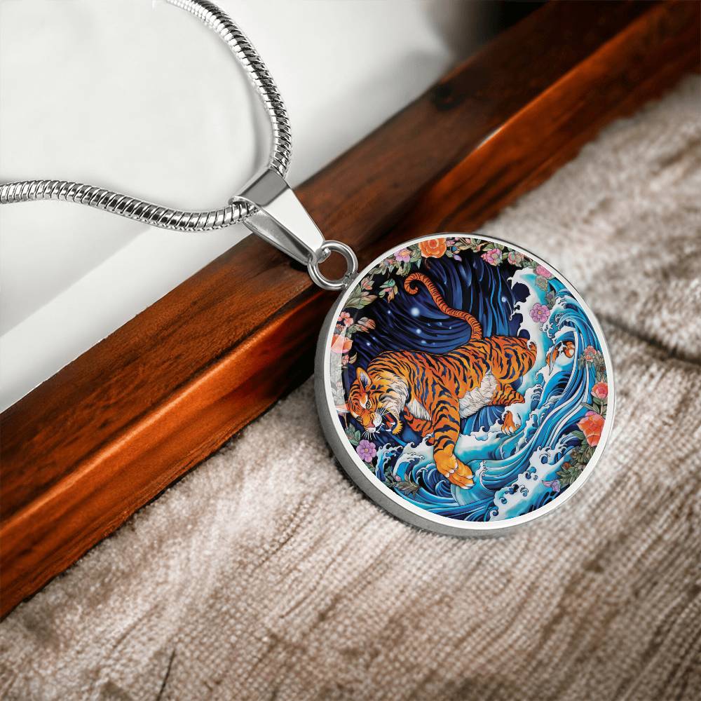 An elegant silver pendant Chinese Zodiac Tiger Necklace. The colors are blue, black, green, orange, white, pink, purple and red. This jewelry offers personalization with an engraving option for a name.