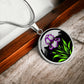 Februarys birth month flower Elegant silver pendant featuring a vivid Purple Iris Necklace set against a Green Grass, Silver moon and mountains background. This necklace offers personalization option for a name.
