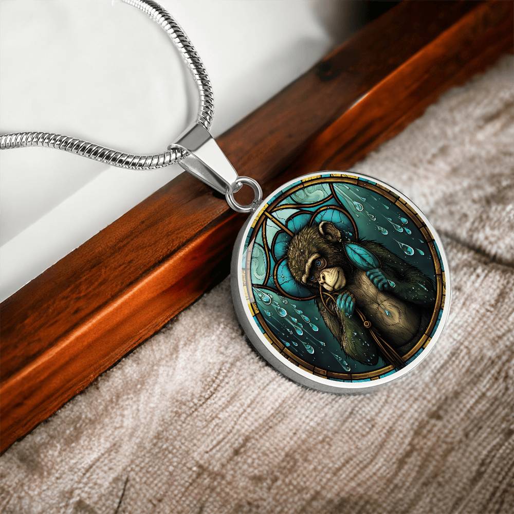 An elegant silver pendant Chinese Zodiac Monkey Necklace. The colors are yellow, blue, teal, brown and green. This jewelry offers personalization with an engraving option for a name.