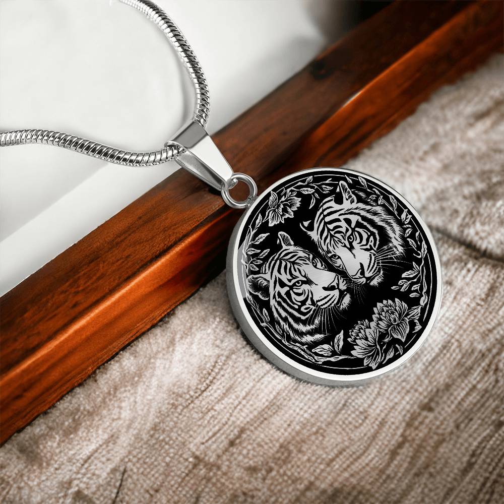 An elegant silver pendant Year of the Tiger Necklace. The colors are silver and black. This jewelry offers personalization with an engraving option for a name.