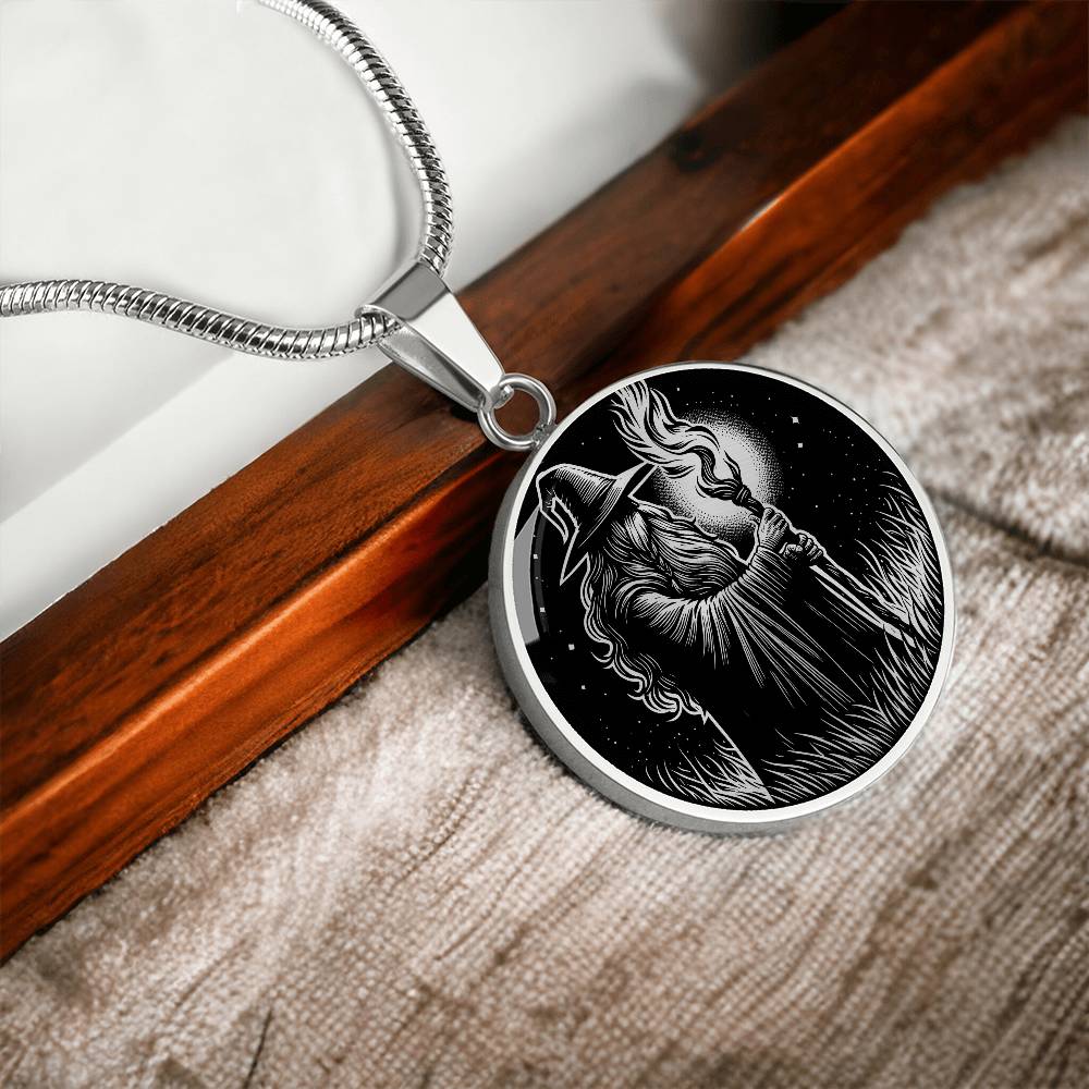 An Elegant silver pendant featuring a Fantasy Wizard Necklace in silver and black. This jewelry offers personalization with an engraving option for a name.