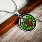 Elegant silver pendant necklace featuring a vivid Mistletoe with red berries set against a silver & black backdrop. This necklace offers personalization with an engraving option for a name.