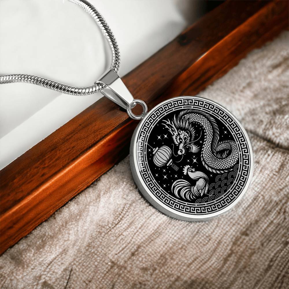 An Elegant silver pendant featuring a Year of the Rooster and Year of The Dragon Necklace in silver and black. This jewelry offers personalization with an engraving option for a name.