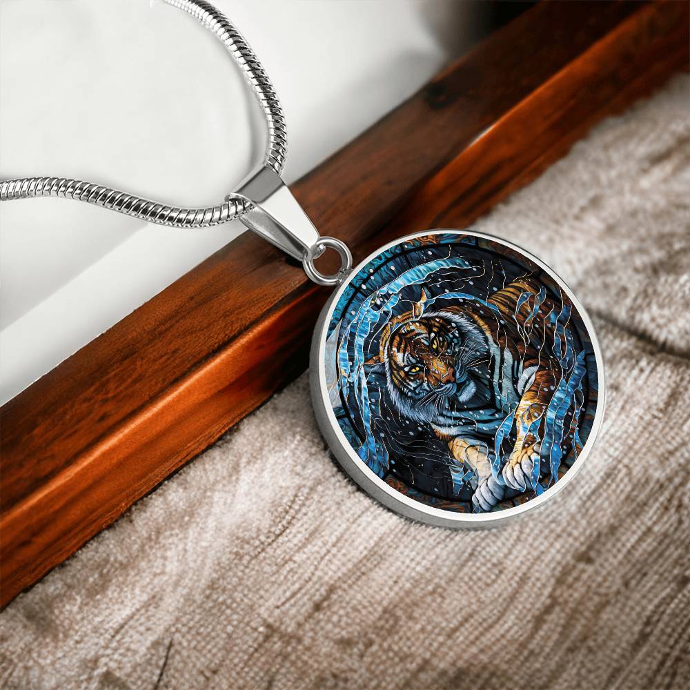 An elegant silver pendant Chinese Zodiac Tiger Necklace. The colors are blue, black, orange, white and yellow. This jewelry offers personalization with an engraving option for a name.