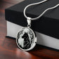 Gift box with an Elegant pendant silver wolf necklace featuring a vivid Black Wolf in the forest, set against a silver backdrop. This jewelry offers personalization with an engraving option for a name.