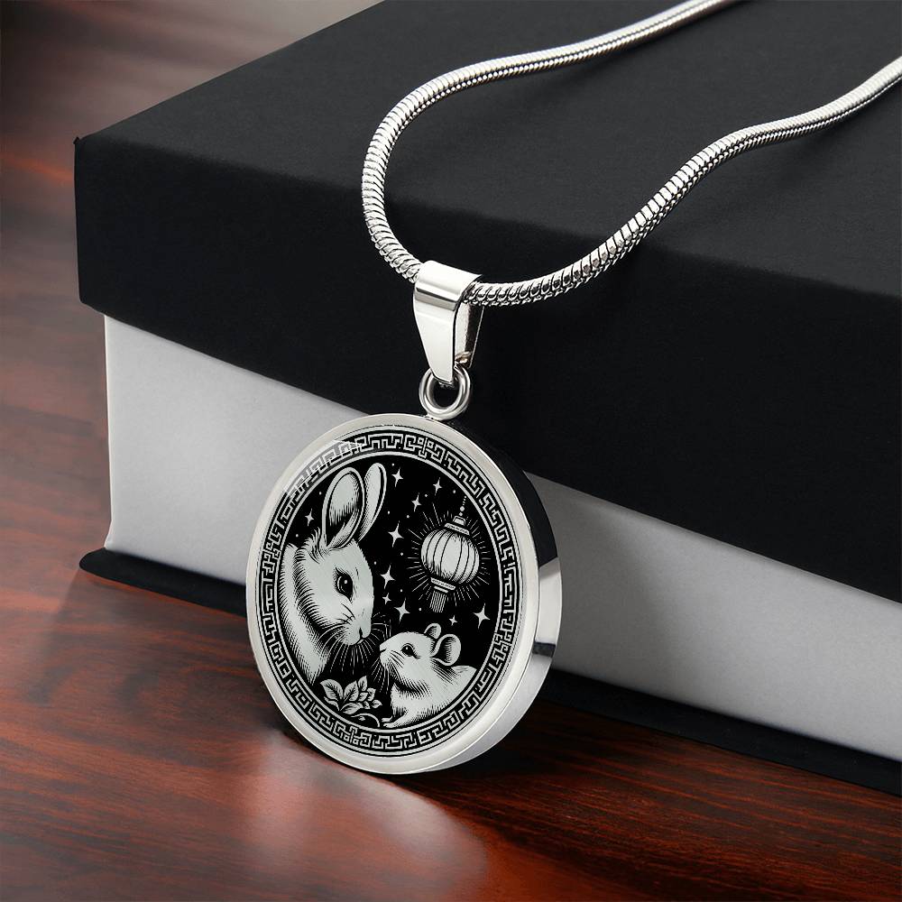 Gift box with An Elegant silver pendant featuring a Year of the Rat and Year of The Rabbit Necklace in silver and black. This jewelry offers personalization with an engraving option for a name.