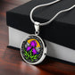 Gift Box with an Elegant silver pendant necklace featuring a vivid Purple Iris set against a sunset mountains with a river, the mountains are colored by the metal shinning through. This necklace offers personalization option for a name.