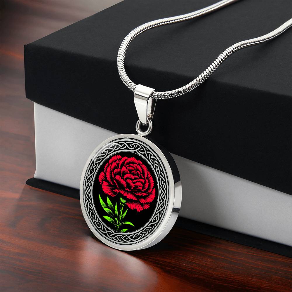 Gift box with an Elegant January Silver pendant Celtic Carnation Birth Flower necklace featuring a vivid red, green flower, set against a Silver & black backdrop. This jewelry offers personalization with an engraving option for a name.