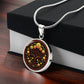 Gift box with an elegant silver pendant Marigold Celtic Tree of Life Necklace. The Colors are yellow, green, brown and black. This jewelry offers personalization with an engraving option for a name.