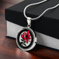 Gift Box with an Elegant silver pendant featuring a vivid red honeysuckle, Junes birth month flower, set against a subtle tan backdrop. This necklace offers personalization with an engraving option for a name.