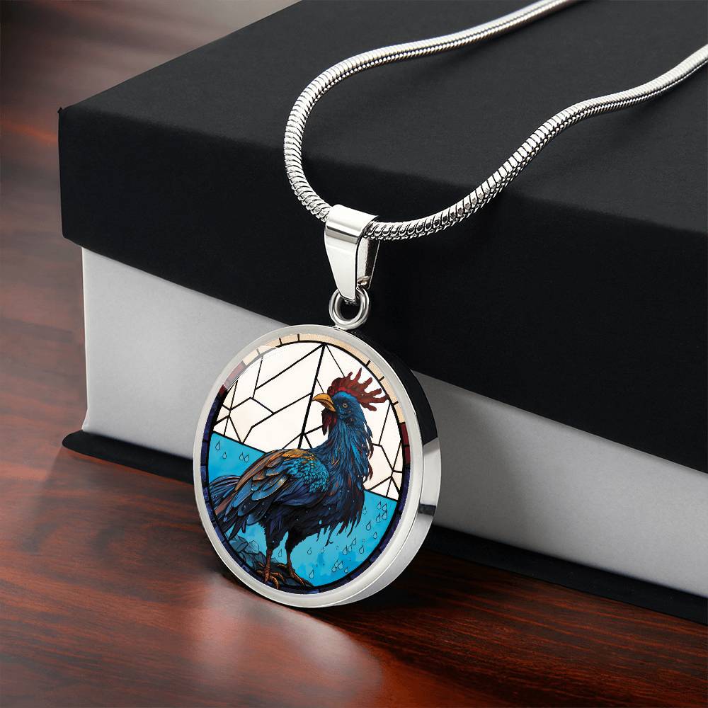 Gift box with an Elegant silver pendant featuring a Chinese Zodiac Rooster Necklace. The colors are blue, white, tan, red, yellow, brown. This jewelry offers personalization with an engraving option for a name.