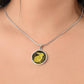 Woman wearing an Elegant silver pendant Rabbit Necklace. Yellow Rabbit and Flowers with a black and brown backdrop. This jewelry offers personalization with an engraving option for a name.