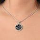 Woman wearing an Elegant silver pendant featuring a Year of the Rooster and Year of The Dragon Necklace in silver and black. This jewelry offers personalization with an engraving option for a name.