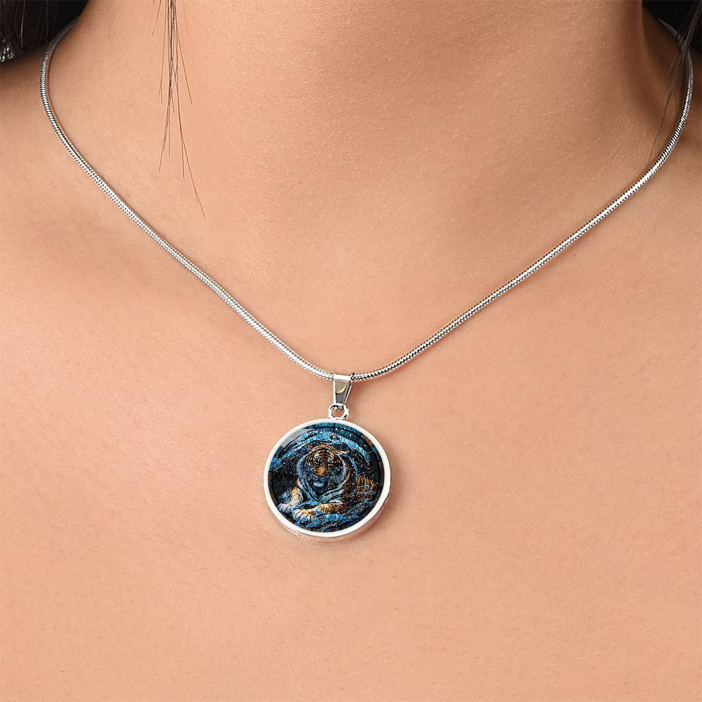 Woman wearing an elegant silver pendant Chinese Zodiac Tiger Necklace. The colors are blue, black, orange, white and yellow. This jewelry offers personalization with an engraving option for a name.