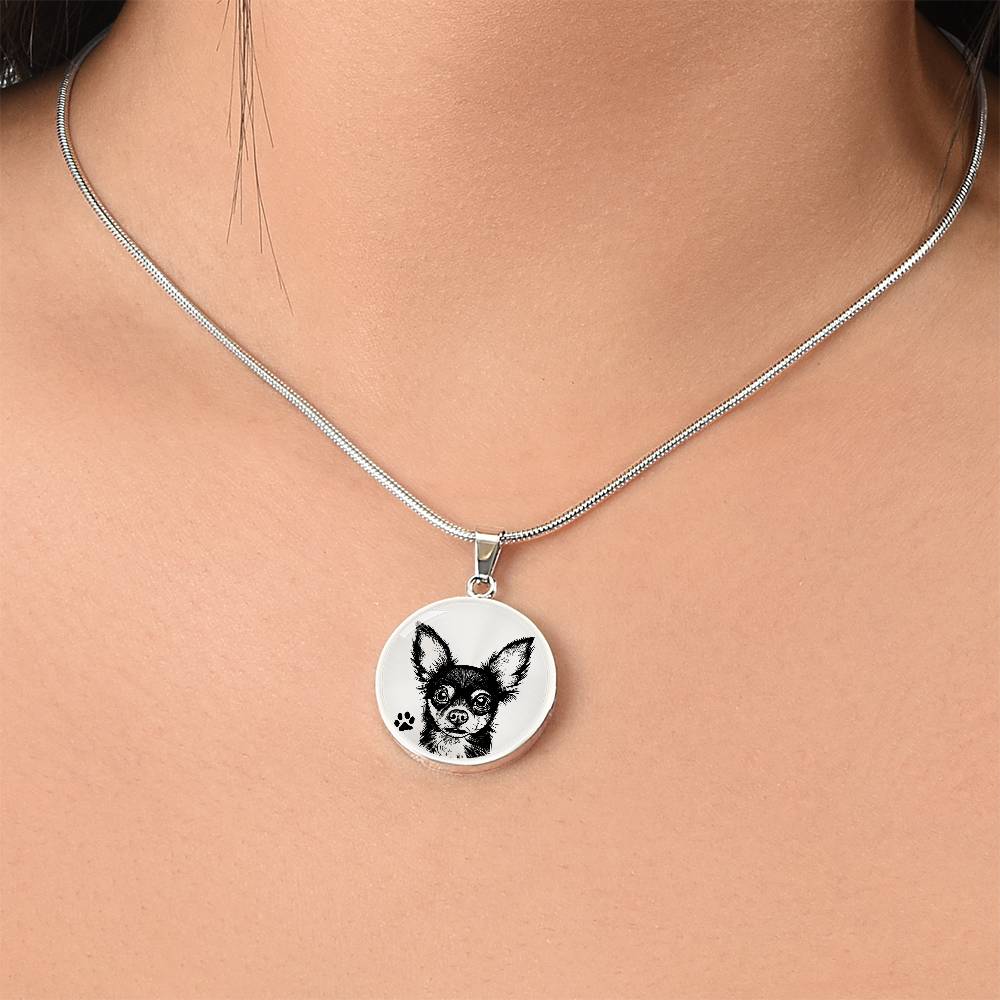 Women wearing An Elegant silver pendant Chihuahua Dog Necklace. The Chihuahua Design is in Silver and Black with a black paw print. This jewelry offers personalization with an engraving option for a name.