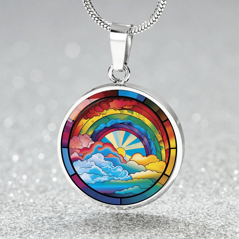 an elegant silver pendant Lucky Rainbow Necklace. The colors are all the colors of the rainbow. This jewelry offers personalization with an engraving option for a name.