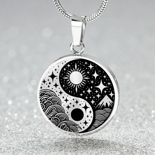 An Elegant silver pendant featuring a vivid Silver and Black Sun and Moon Necklace. This jewelry offers personalization with an engraving option for a name.